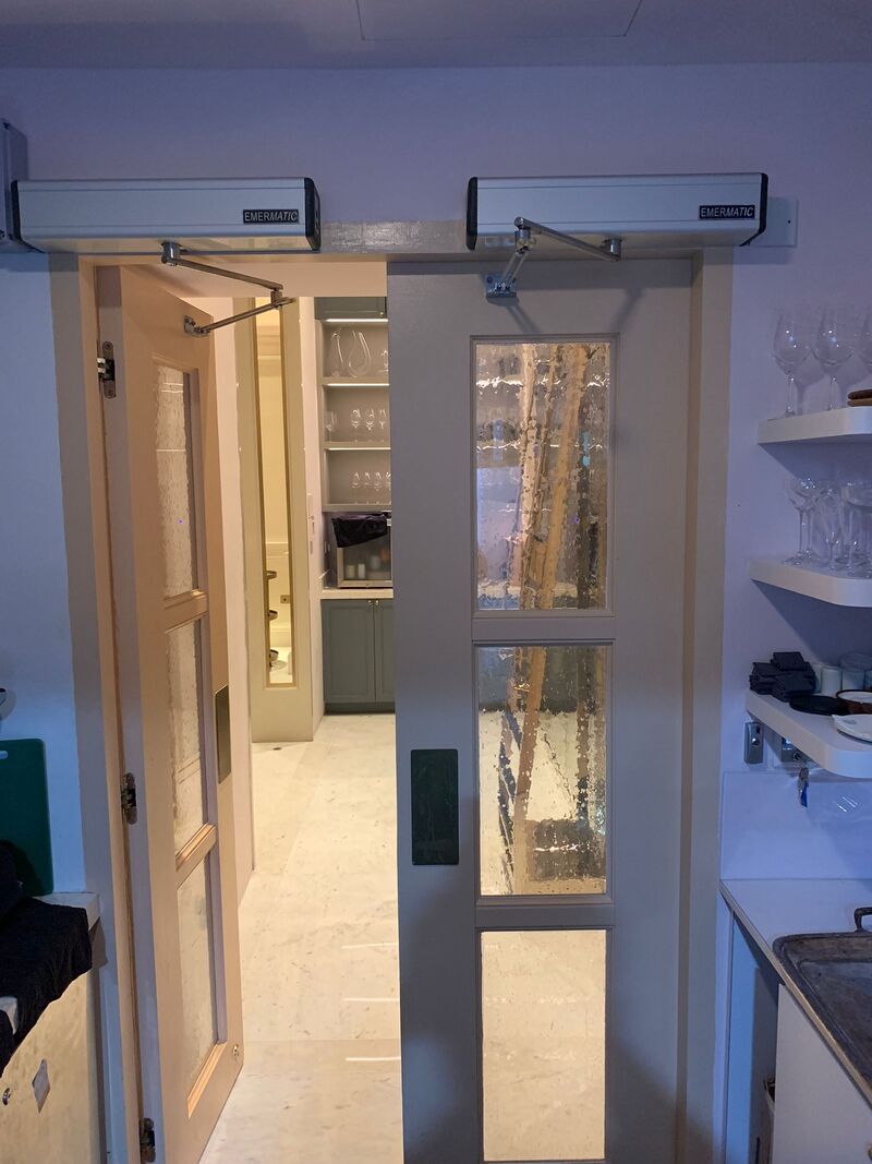 Raffles Hotel Auto Swing Kitchen Doors